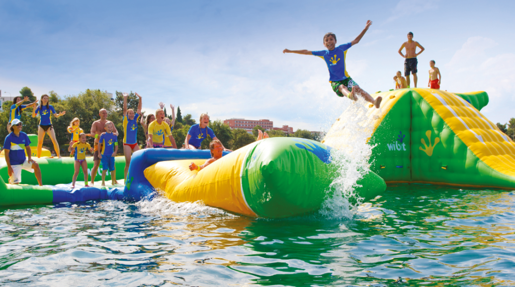 Families Enjoying WIBIT Water Park in Santa Rosa, New Mexico